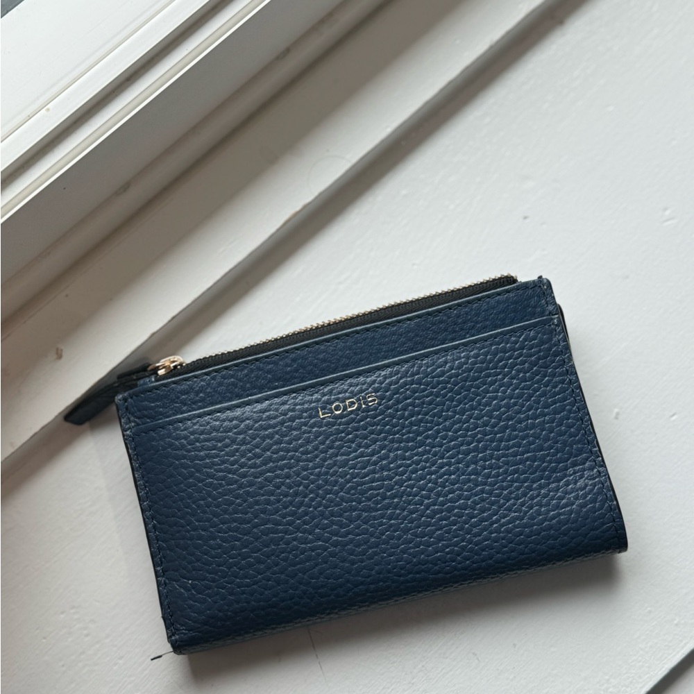 Lodi’s blue leather wallet